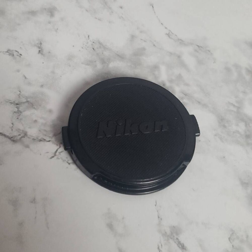 Nikon 52m. Camera Cap
